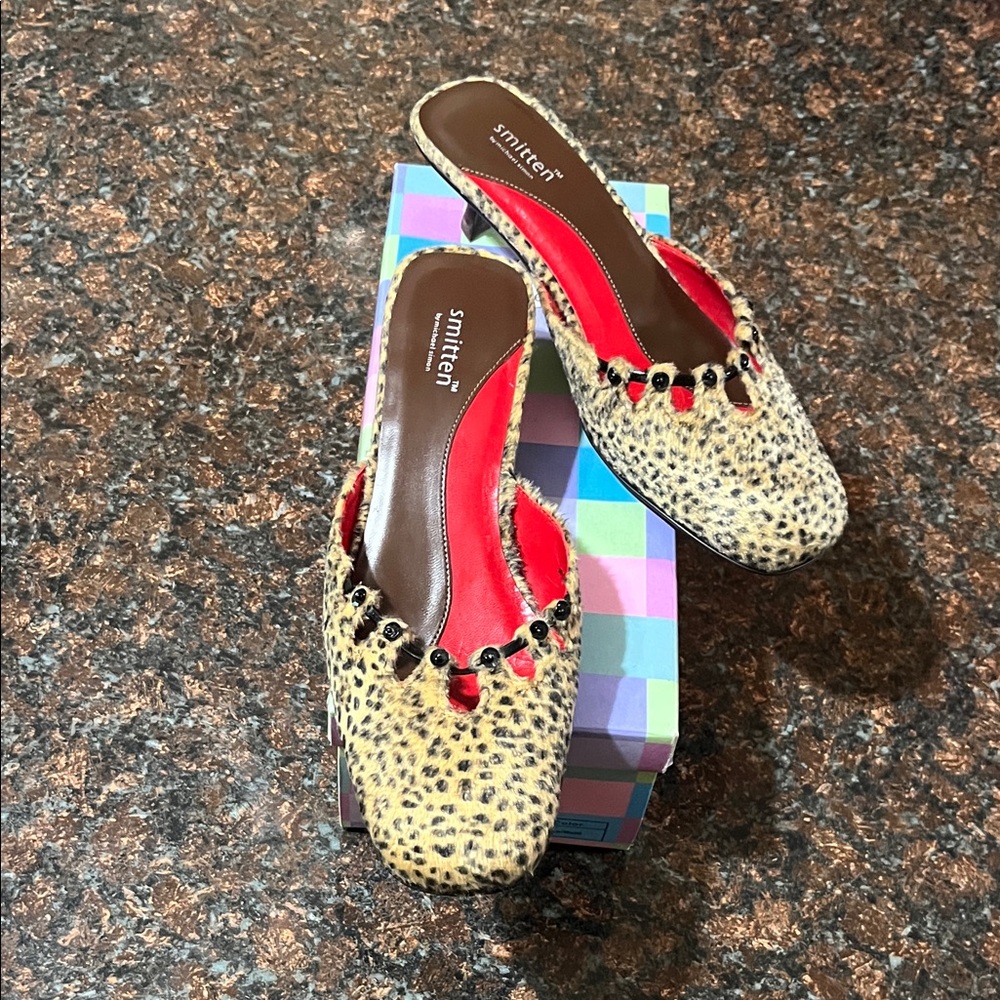 Smitten by Michael Simon Leopard Print Mules with Red Accents.